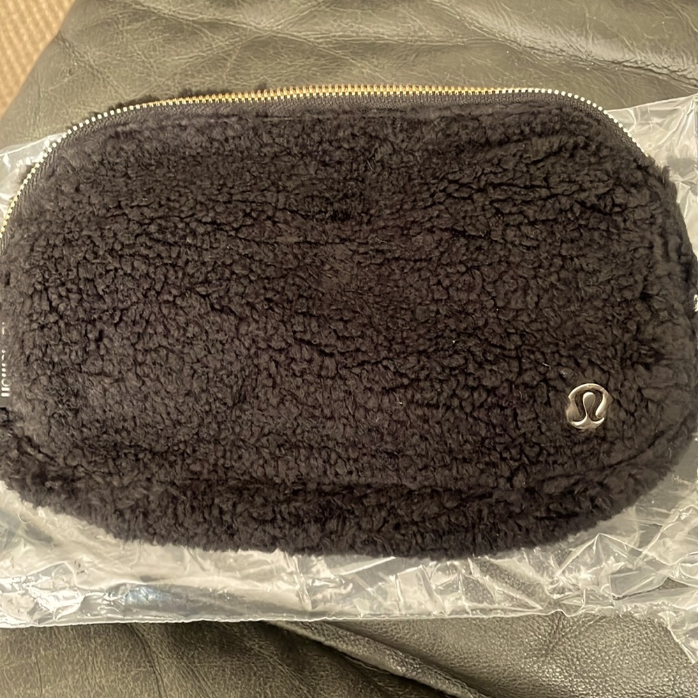 Lululemon everywhere belt bag *fleece in black, gold hardware and symbol